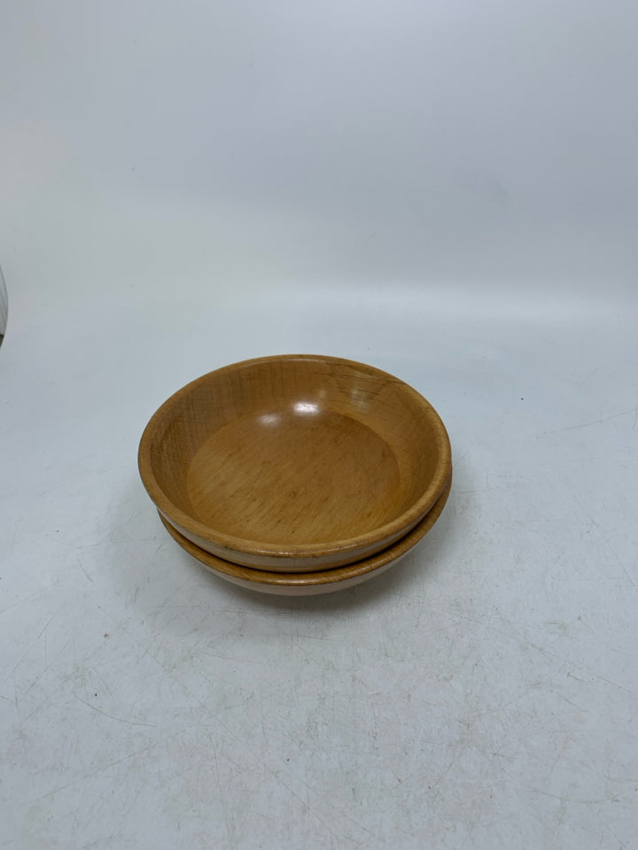 2 SMALL LIGHT COLORED WOOD CARVED BOWLS.
