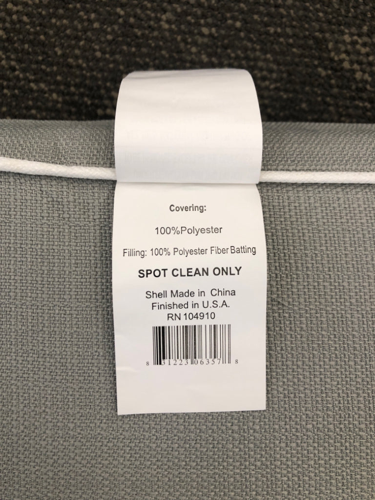 GRAY SEAT CUSHION W/WHITE TRIM.