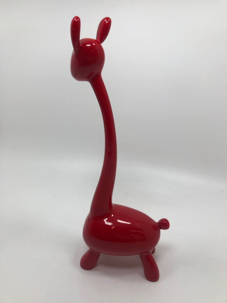 RED RESIN GIRAFFE SCULPTURE.