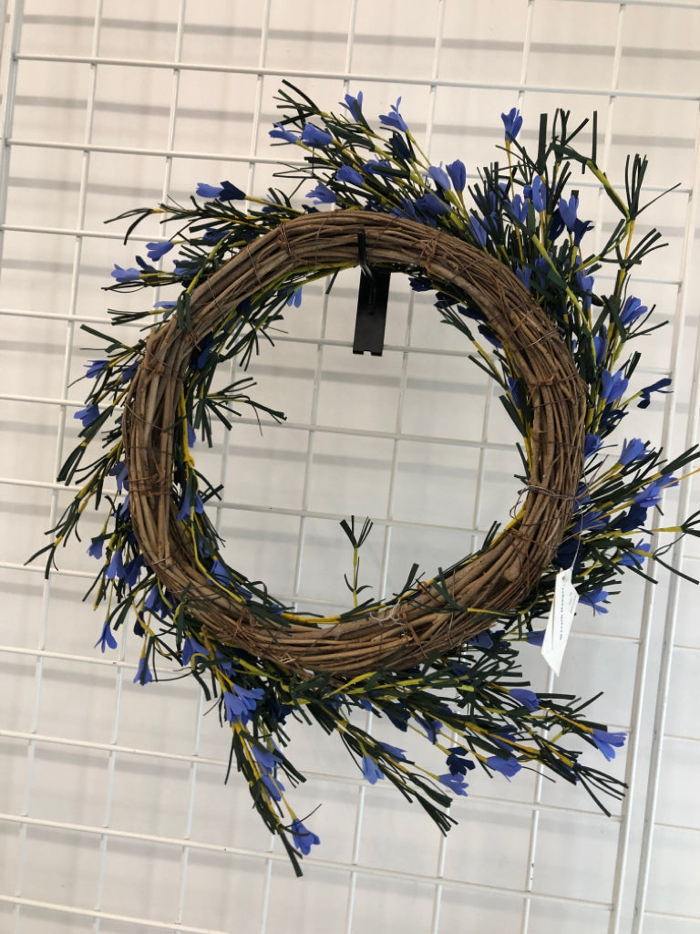 BLUE/YELLOW FOAM FLOWER WREATH.