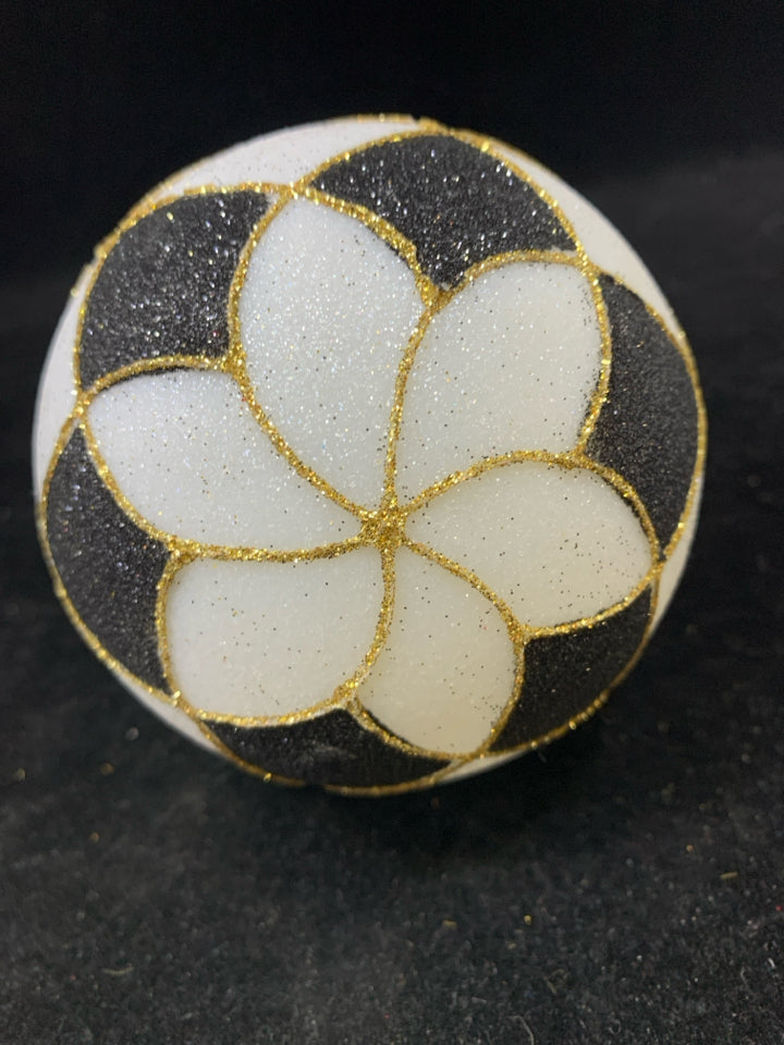 4 BLACK/WHITE CHECKERED GLASS ORNAMENTS.