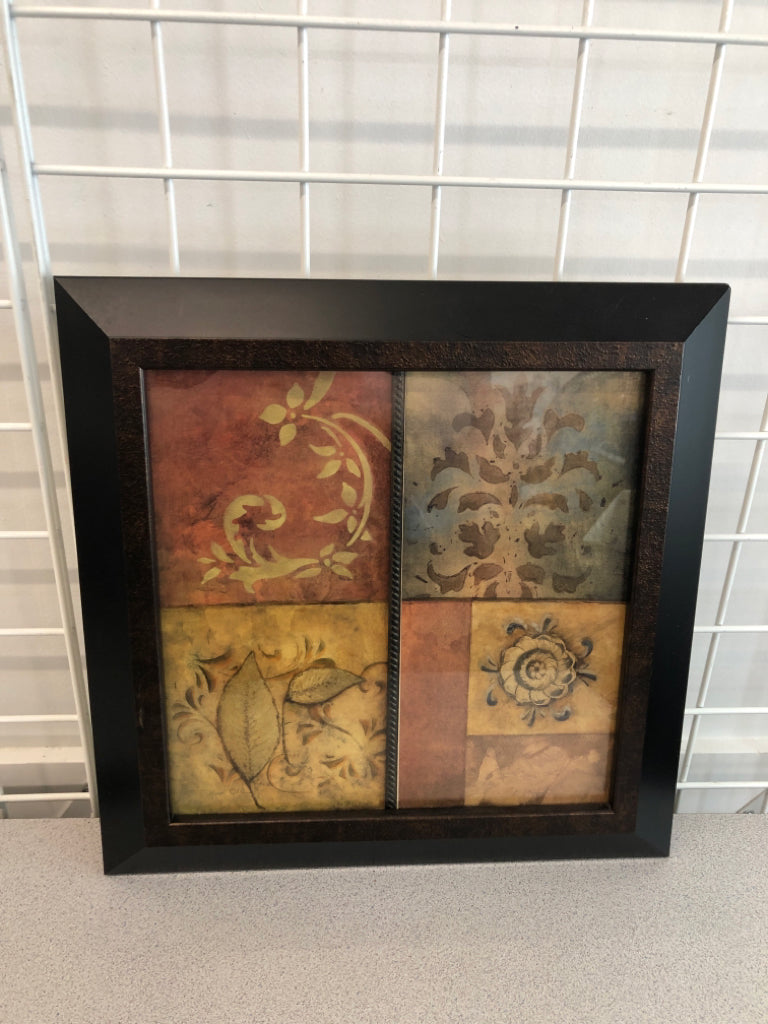 BROWN BOTANICAL SQUARES IN BLACK WOOD FRAME.