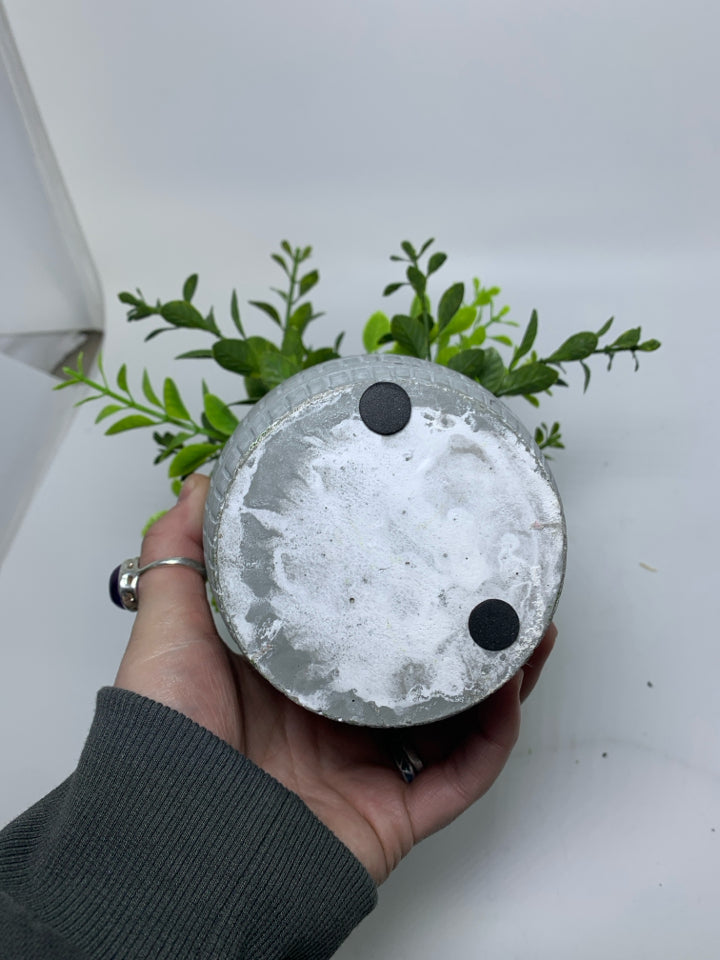 GREY W/ WHITE LINES PLANTER W/ FAUX LEAVES.