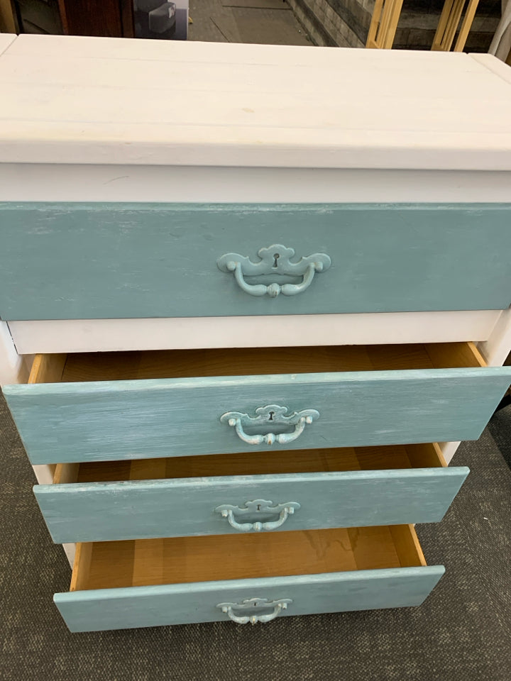 WHITE SHORT DRESSER W 4 TEAL DRAWERS.