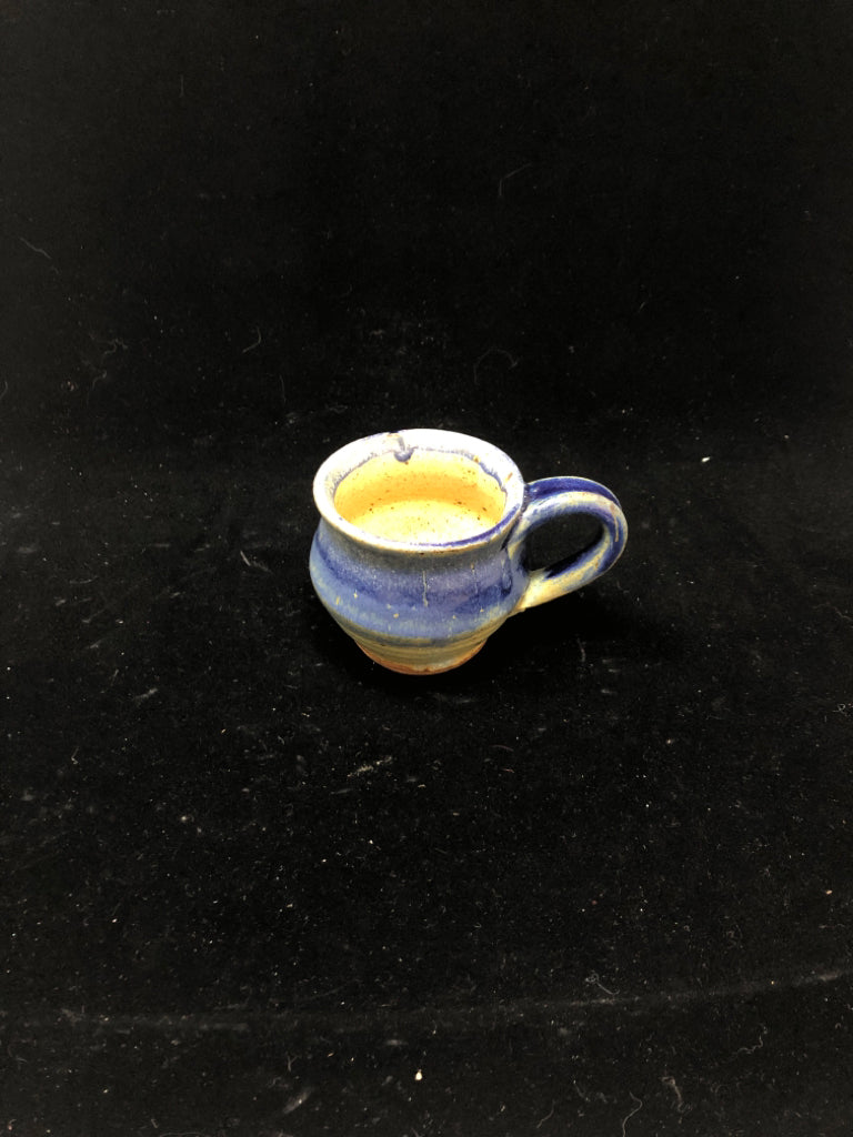 BLUE DIPPED STONEWARE MUG.