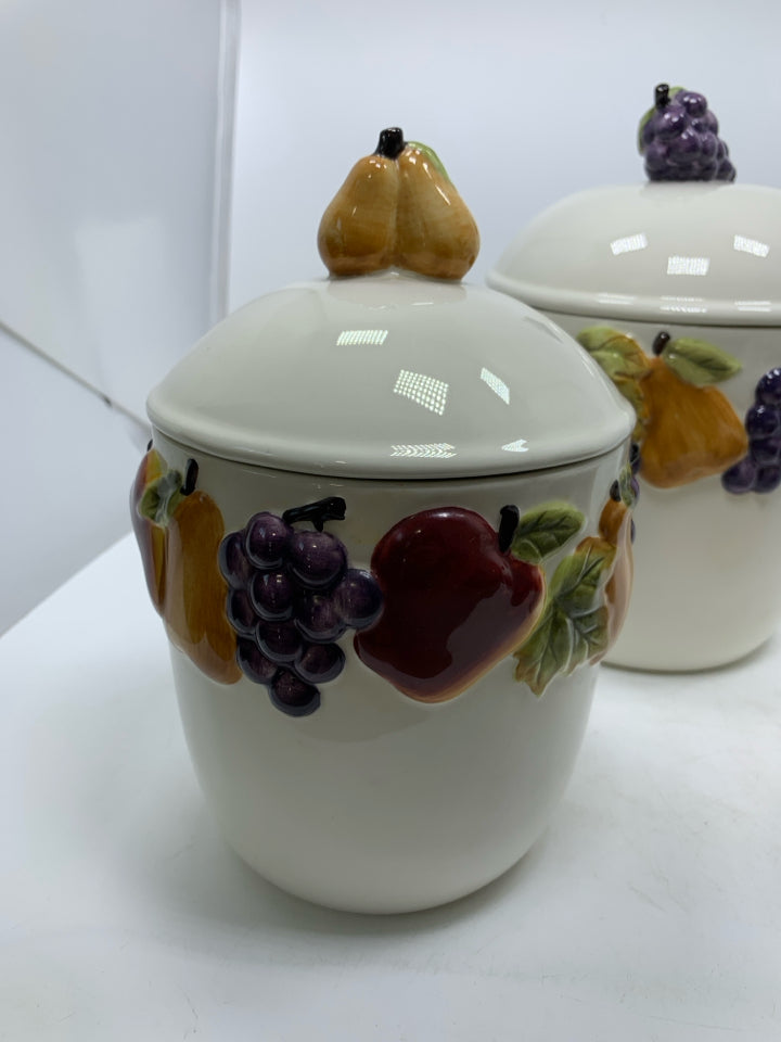 3 CERAMIC EMBOSSED FRUIT CANISTERS.