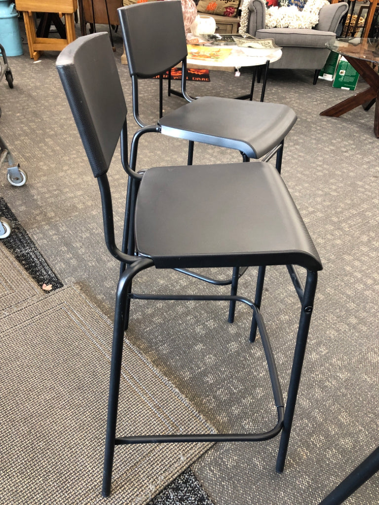 4 BLACK PLASTIC IKEA BAR STOOLS.
