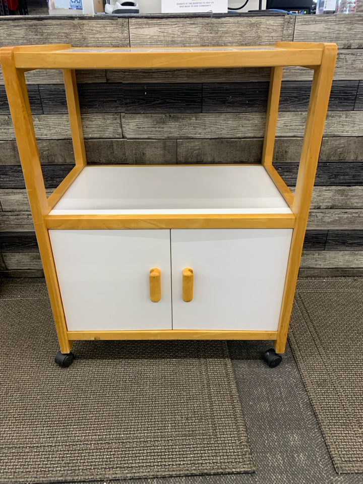 ROLLING KITCHEN CART BLONDE WOOD & WHITE W/TILE COUNTER TOP & 2 DOORS.