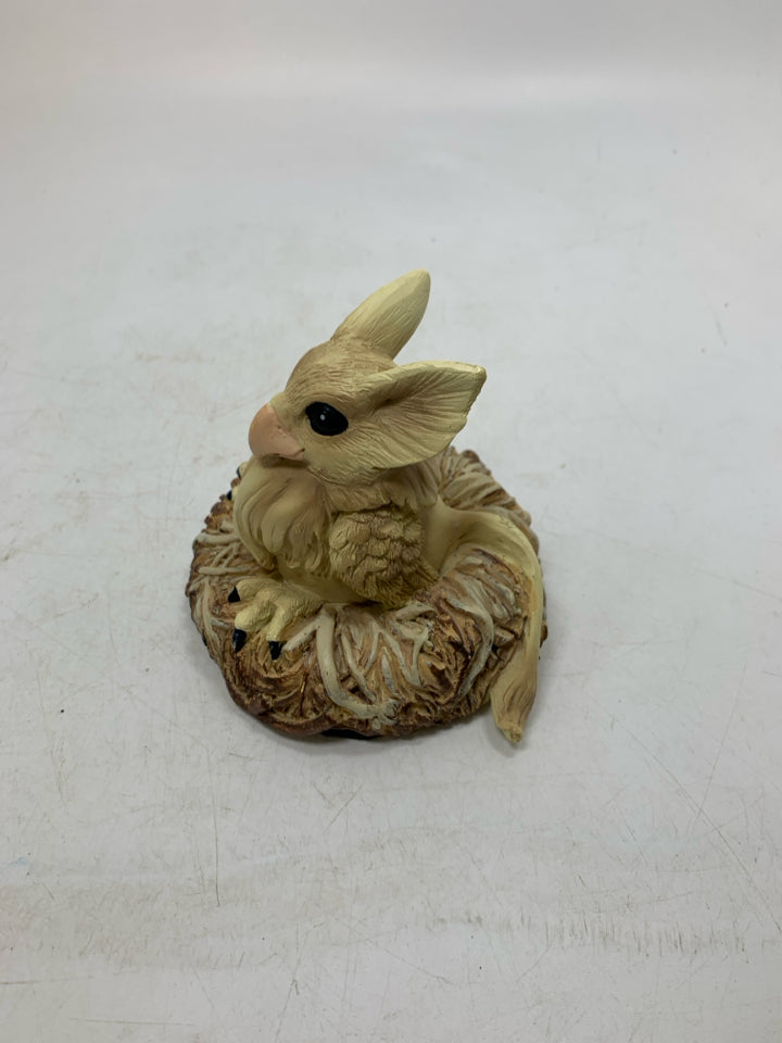 GRIFFIN W/ LONG EARS IN NEST RESIN FIGURINE.