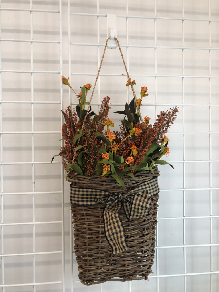 FAUX FALL FOLIAGE IN DRK BASKET WALL HANGING.