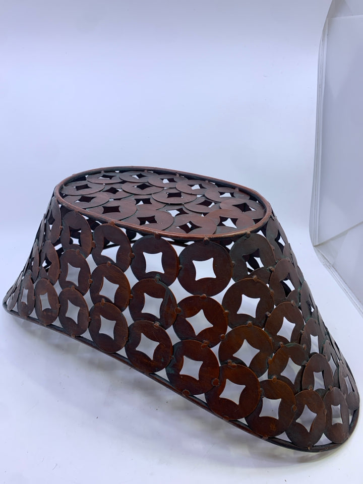 BROWN METAL CUTOUT BASKET.