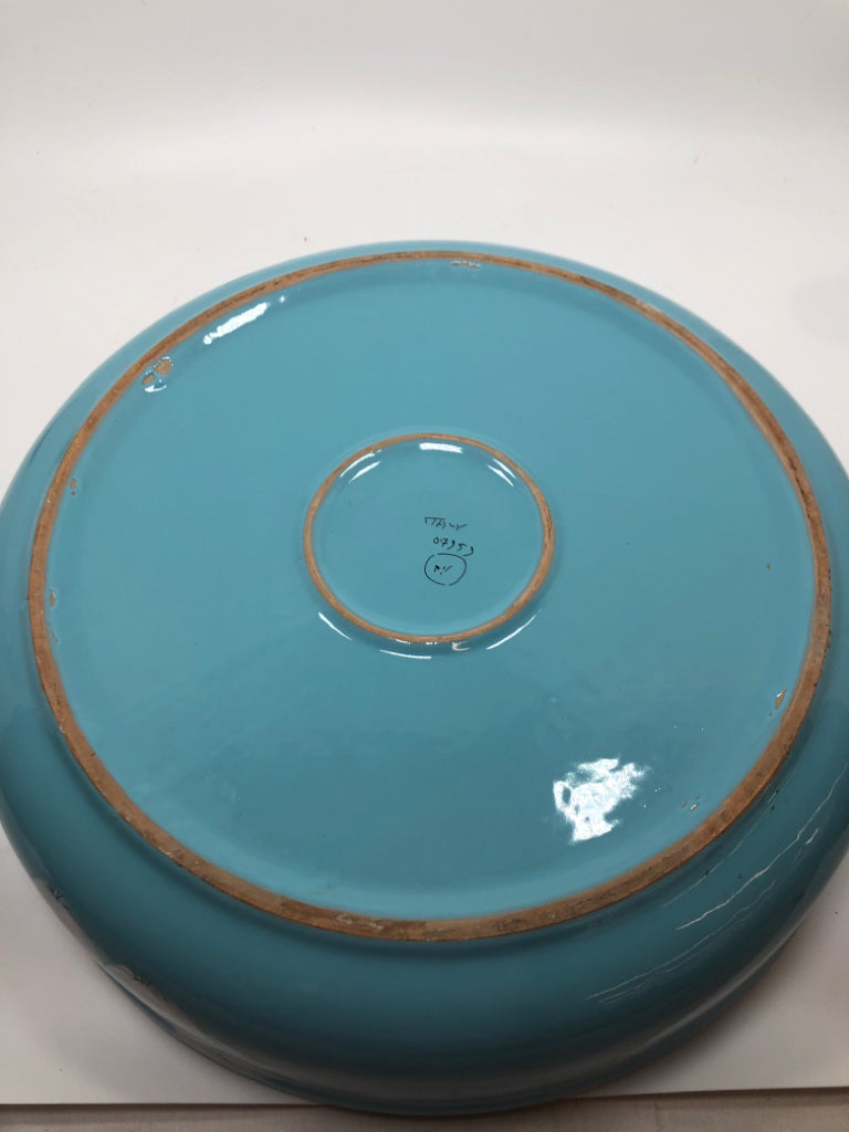 BLUE CERAMIC SERVING BOWL W/WHITE PAINTED FRUITS.