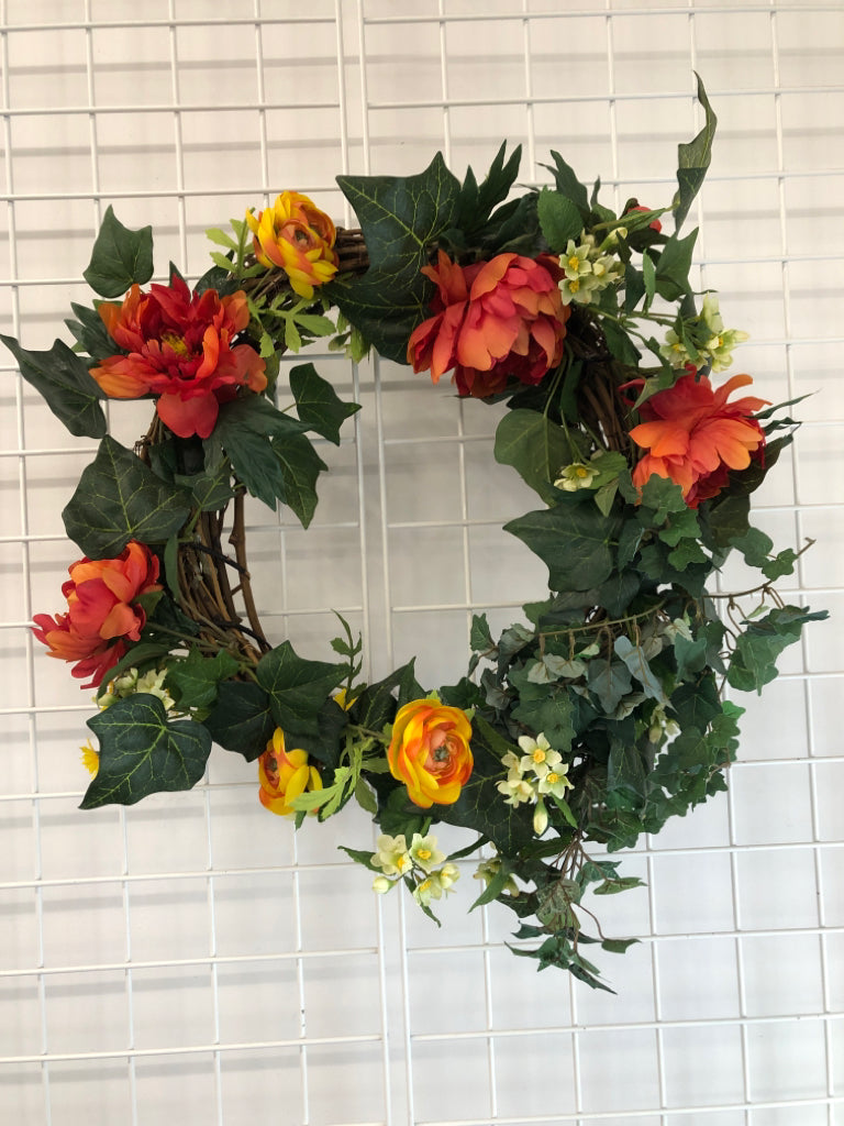 FAUX RED FLOWERS W/IVY WREATH.