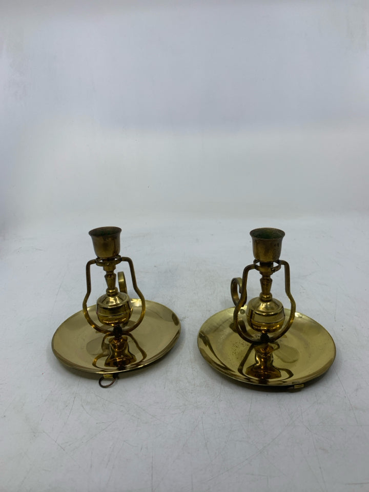 2 SELF LEVELING BEDSTICK CANDLE HOLDERS.