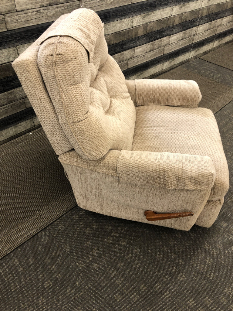 RECLINING CREAM CHAIR.