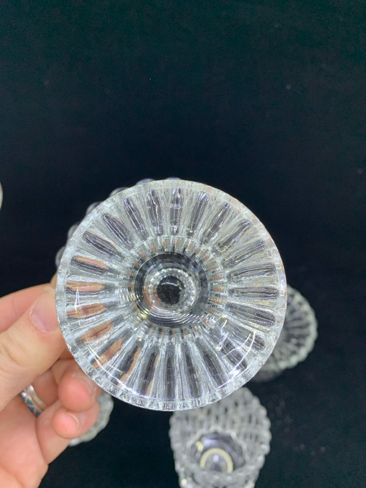 4 PC CRYSTAL VOTIVE CANDLE HOLDERS.