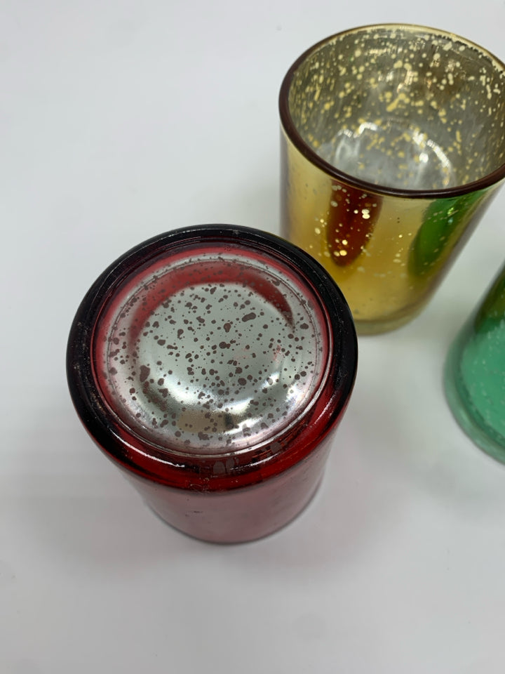 3 MULTI-COLORED SPECKLED VOTIVE HOLDERS.