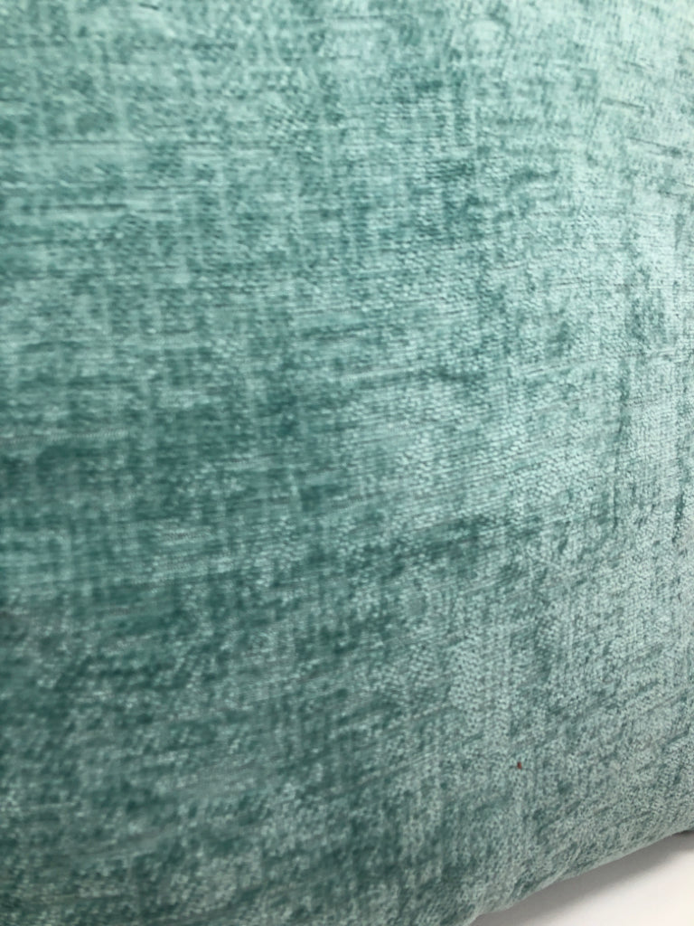 TEAL FABRIC PILLOW.