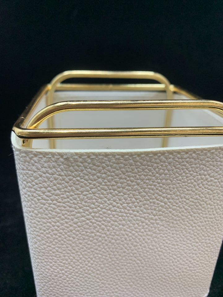 GOLD AND WHITE FAUX LEATHER DESK ORGANIZER.