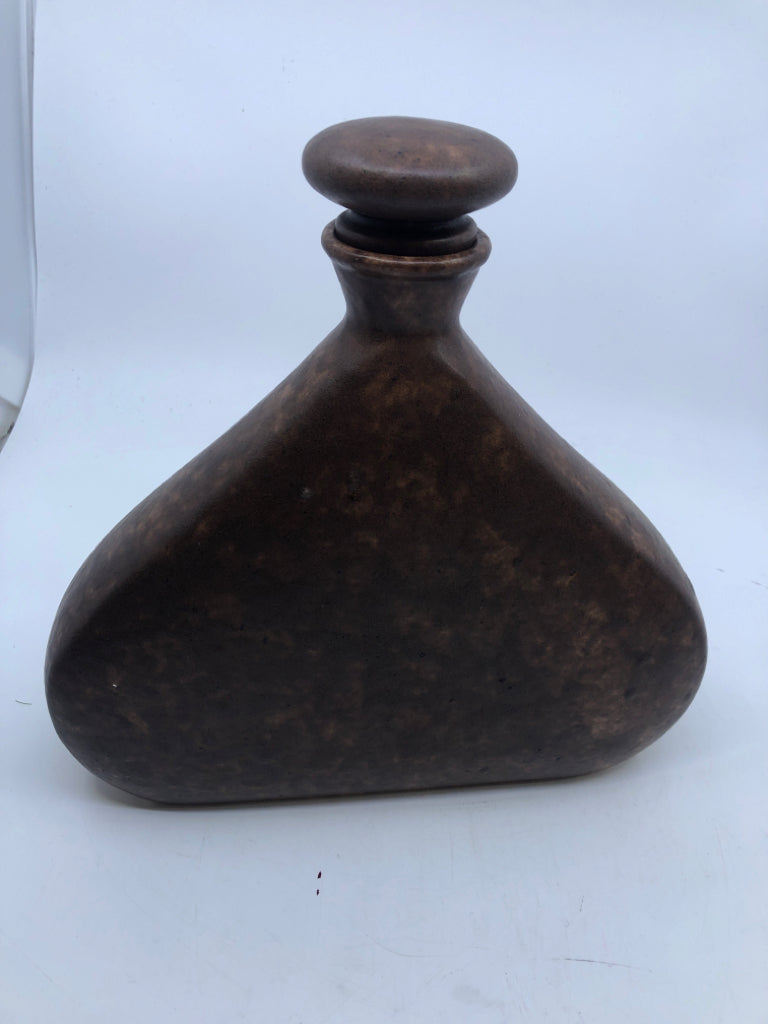 WIDE CERAMIC EMBOSSED INDIGENOUS MAN DECANTER W STOPPER.