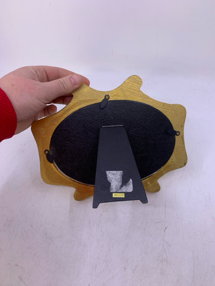 OVAL W/ GOLD FRAME TIGER AND KID WALKING ON LOG.