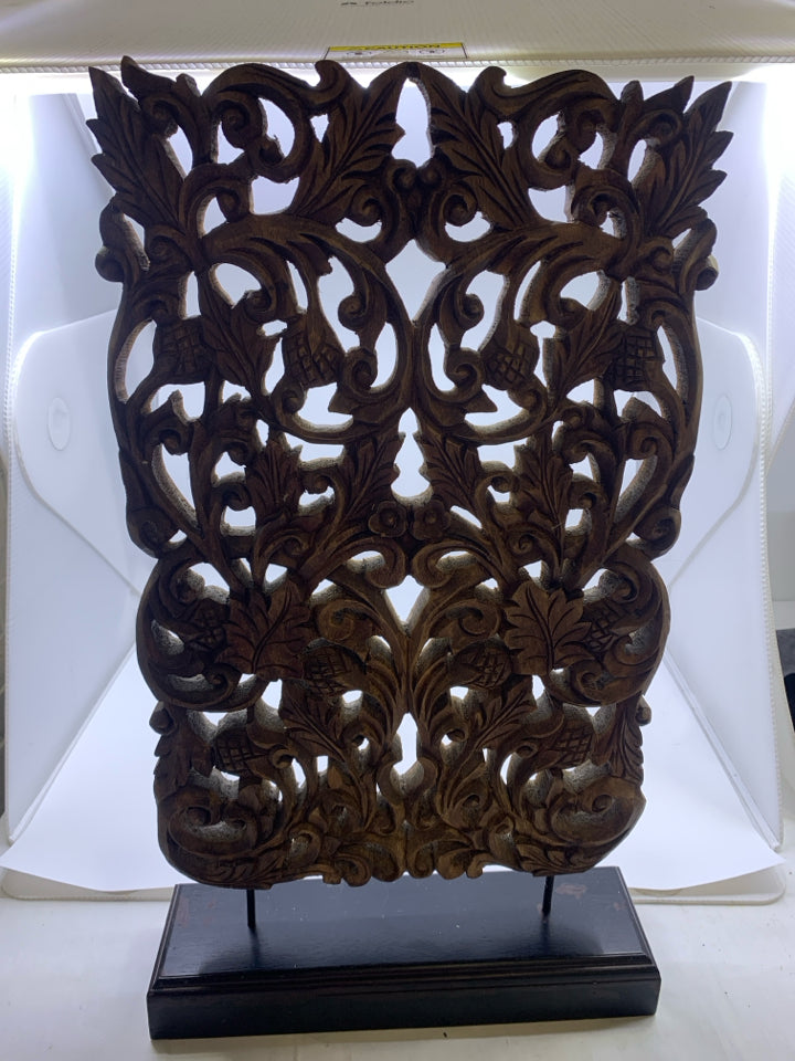 LARGE WOOD CARVED DECOR PIECE.