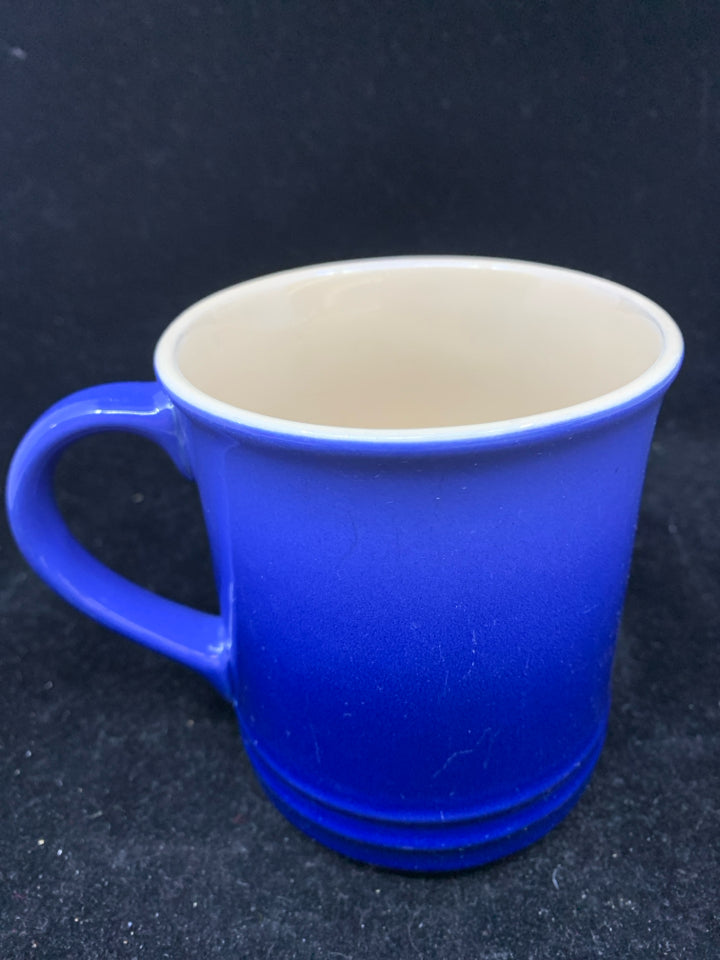 BLUE LE CREUSET MUG.