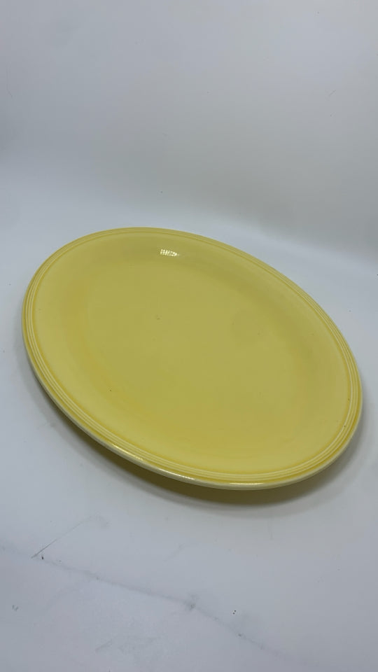 VTG YELLOW OVAL SERVING PLATTER.