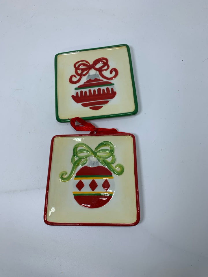 2 SMALL CERAMIC SQUARE EMBOSSED ORNAMENT WALL HANGING.