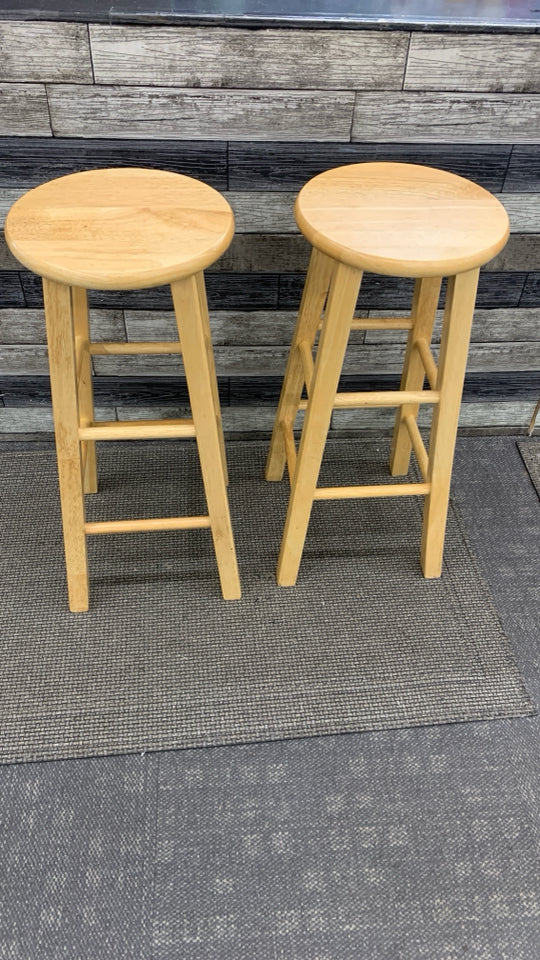 2 BLONDE WOOD STOOLS.