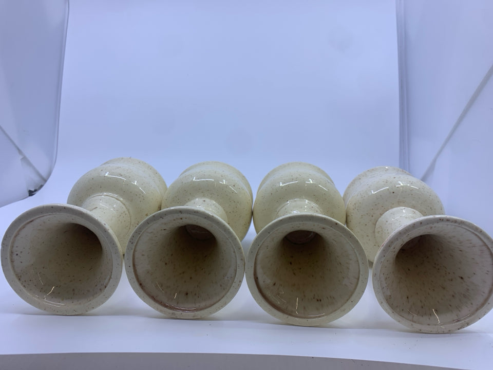 4 CREAM W/ SPECKLES POTTERY GOBLETS.