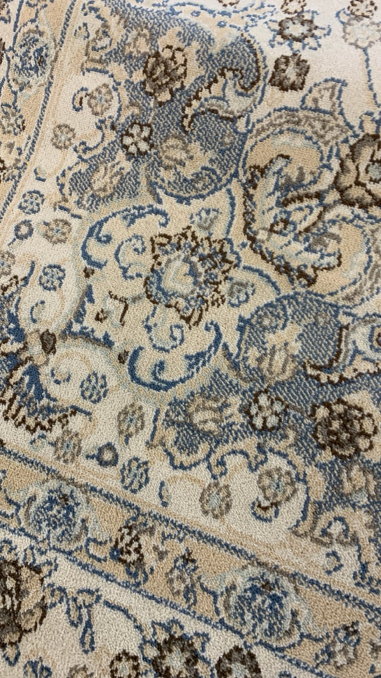 CREAM AREA RUG W/ BLUE,BROWN,GREY PAISLEY DESIGN EDEN.