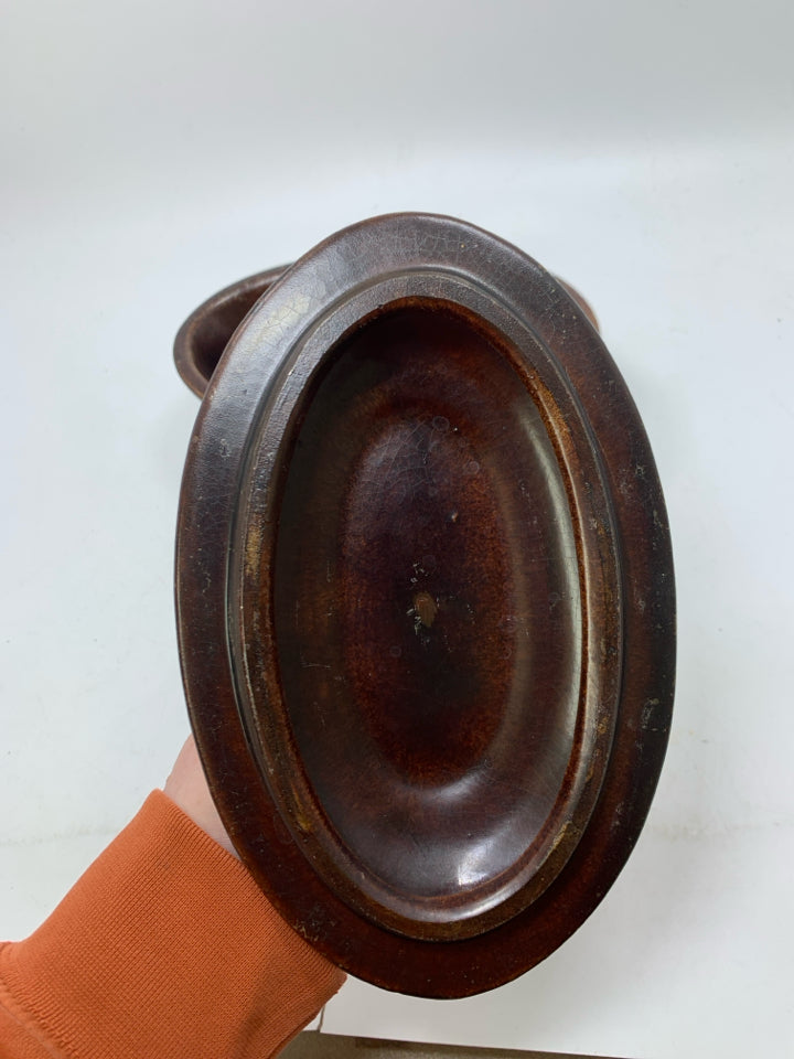 OVAL DARK BROWN W/ SCROLL LAYING RABBIT ON LID.