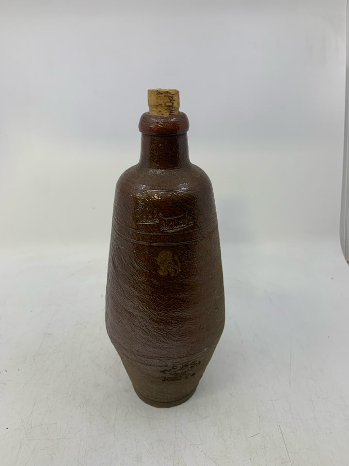 VTG EMPTY DARK BROWN POTTERY BOTTLE.