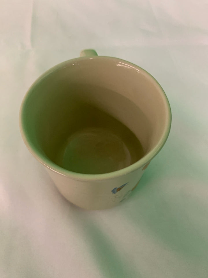 VTG TAN ORANGE FLORAL MUG.