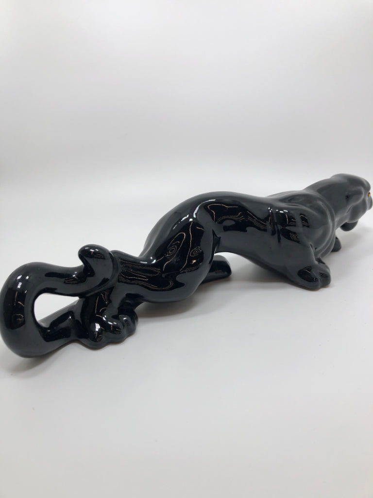 CERAMIC PANTHER W/GOLD EYES.
