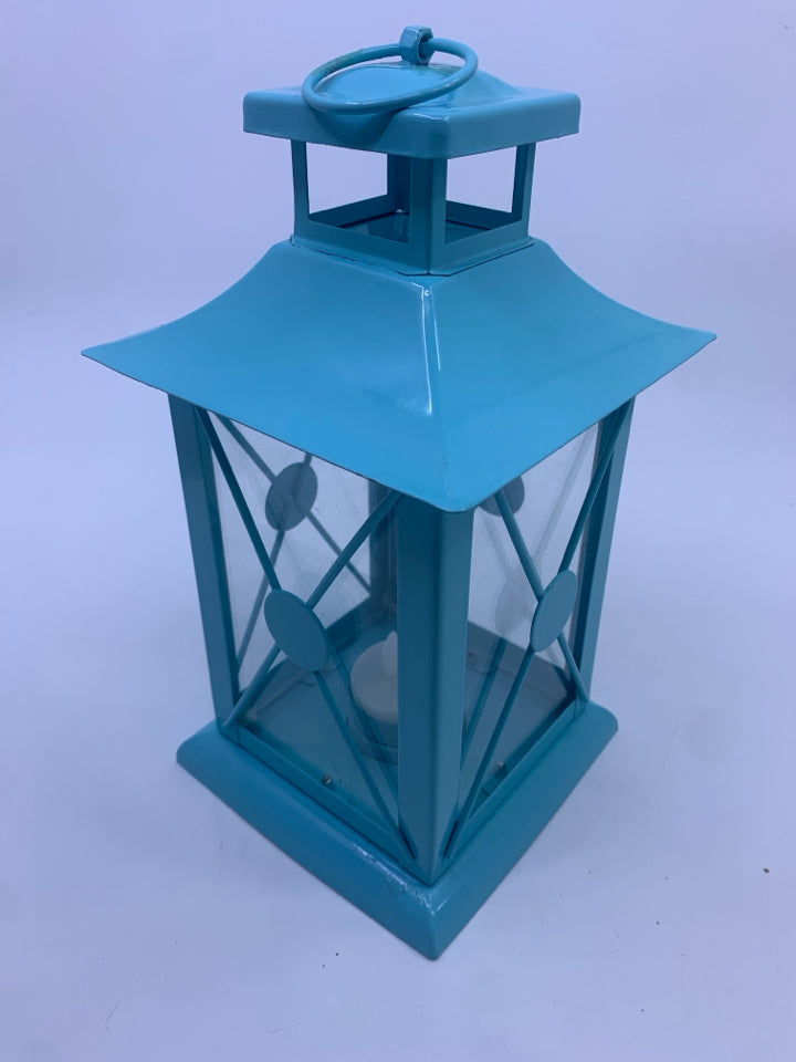 LIGHT BLUE METAL TEA LIGHT LANTERN.
