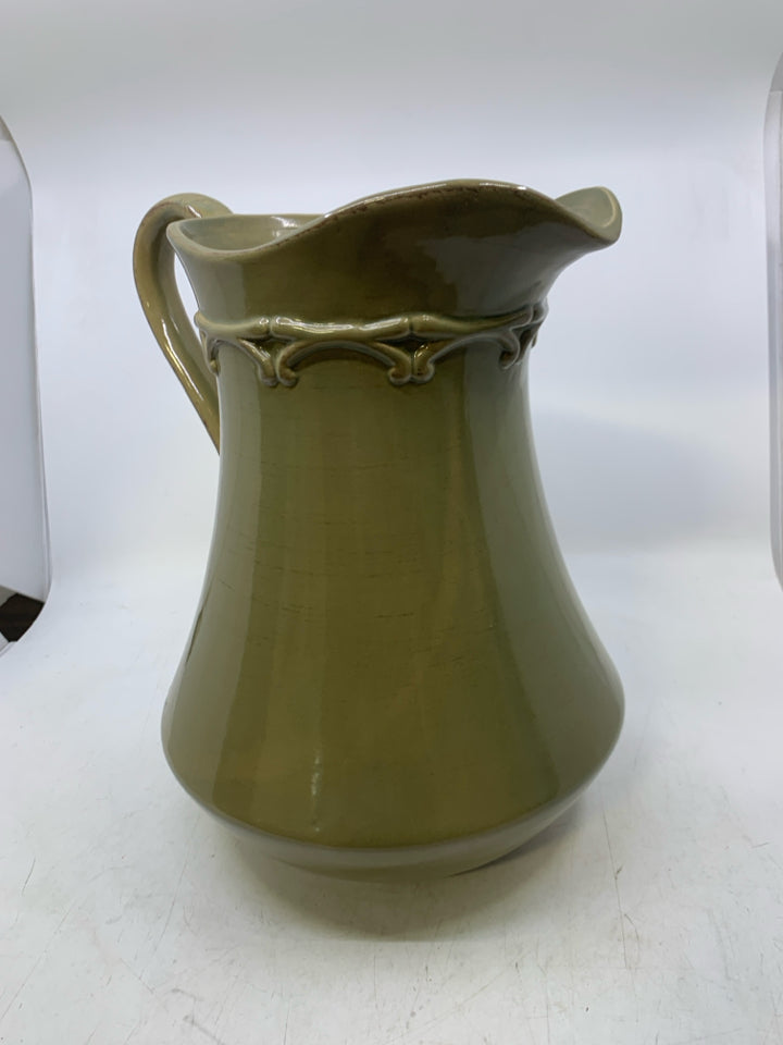 LARGE CERAMIC PITCHER W/ EMBOSSED DETAILED NECK.