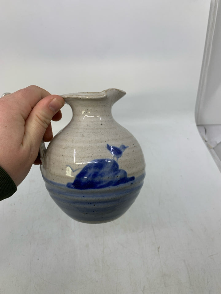 LIGHT GREY W/ BLUE BOTTOM PITCHER W/ SEAGULL ON ROCK.