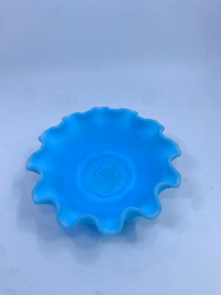 VTG FOOTED LIGHT BLUE FENTON BOWL W/ RUFFLED EDGE.