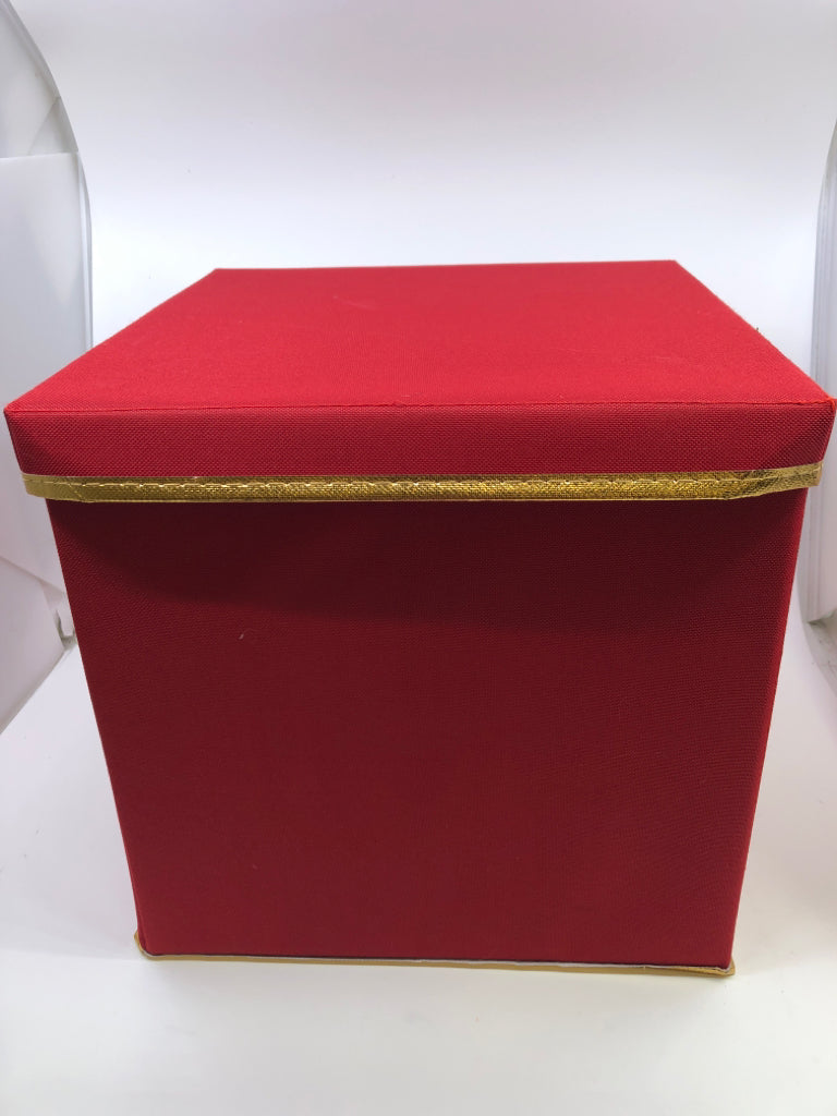 RED STORAGE BOX W GOLD TRIM, LID, AND HANDLES.
