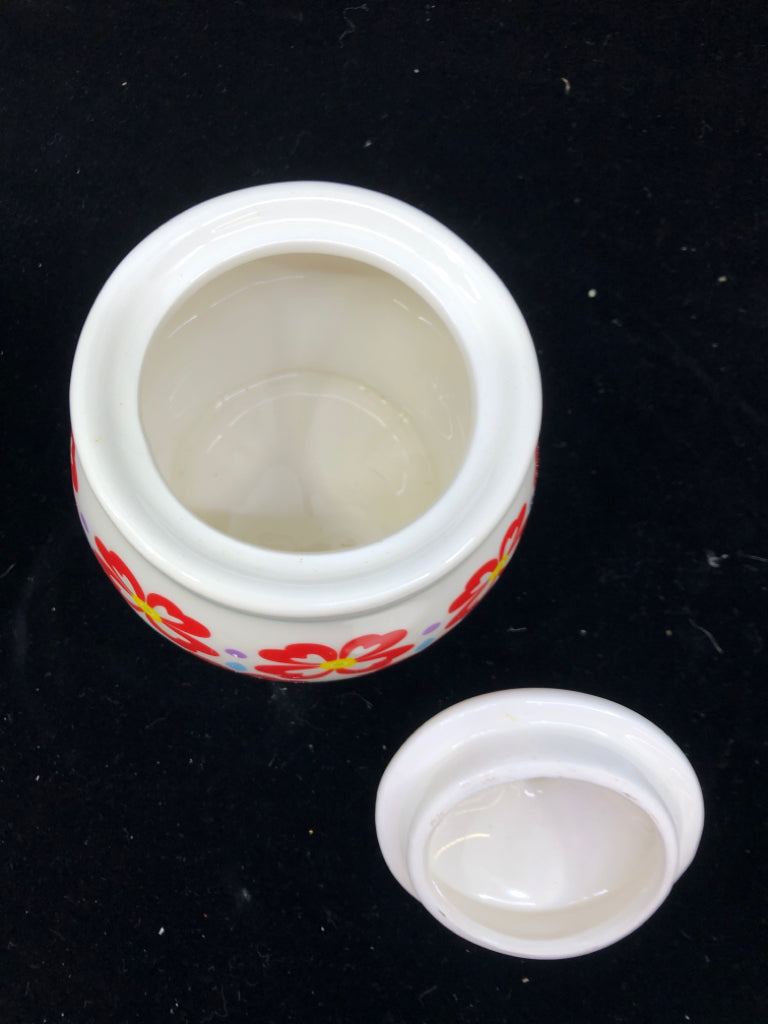 2 PC WHITE W/ RED/PURPLE FLOWERS SUG/CREAMER SET.