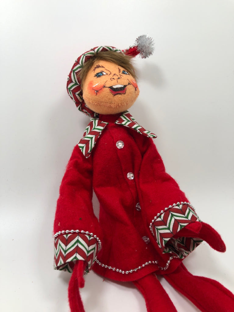 ANNALEE RED LONG LEGGED ELF DRESSED IN RED.