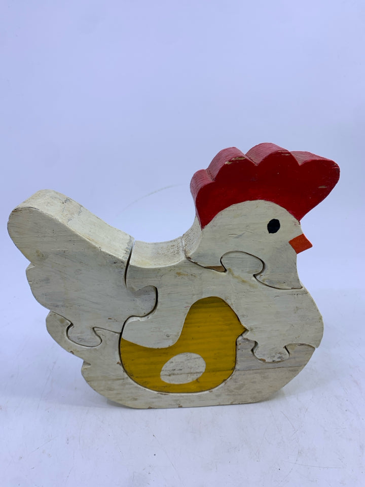 PRIMITIVE WHITE CHICKEN W/ YELLOW BABY CHICK PUZZLE PIECES.