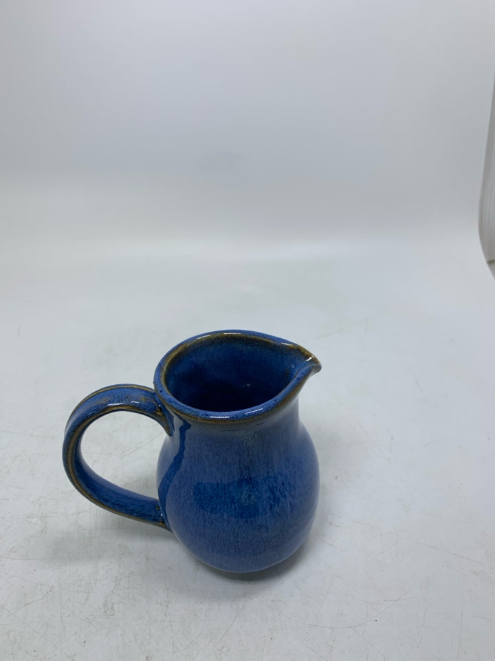 BRIGHT BLUE POTTERY PITCHER.