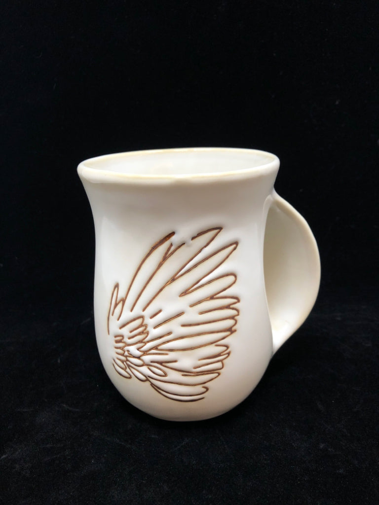 WHITE WING EMBOSSED CERAMIC COFFEE MUG.