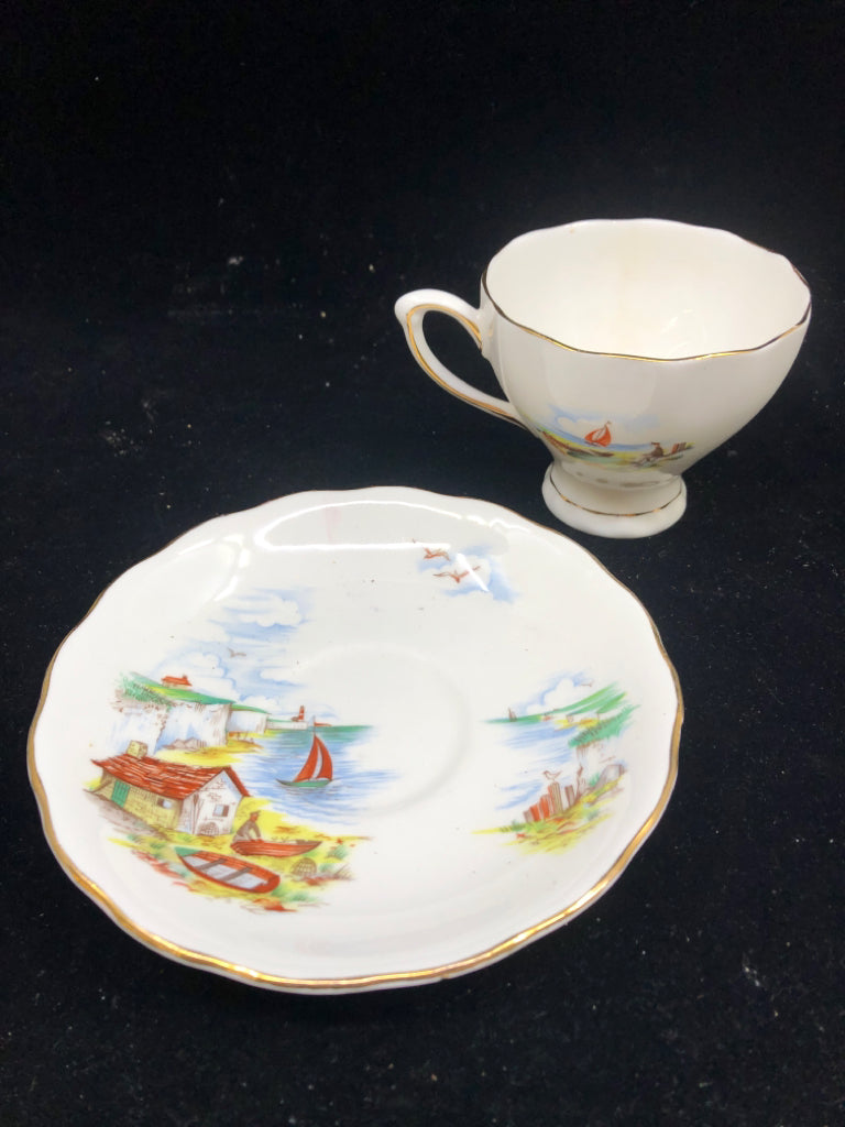 BEACH W SAILBOAT SCENE TEACUP AND SAUCER.