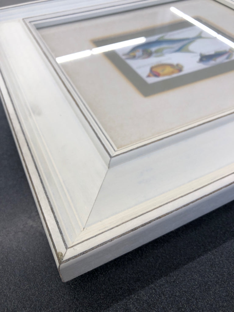 FISH IN CREAM FRAME WALL ART.