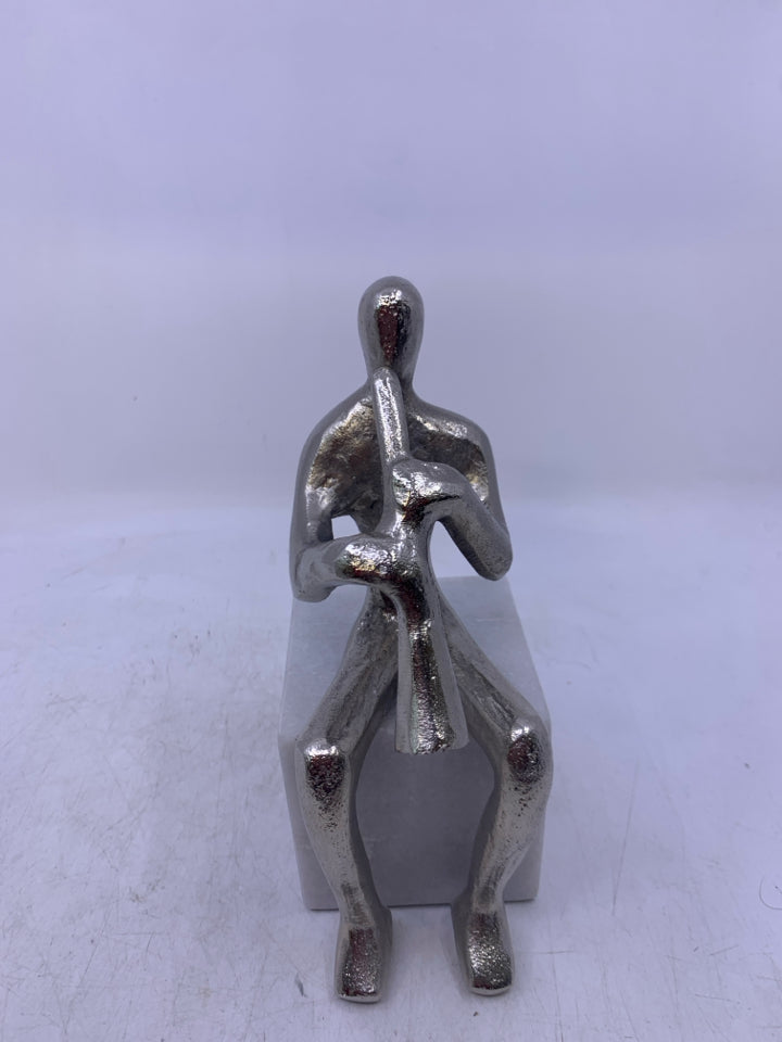 SQUARE MARBLE W/ SILVER METAL MAN PLAYING INSTRUMENT.