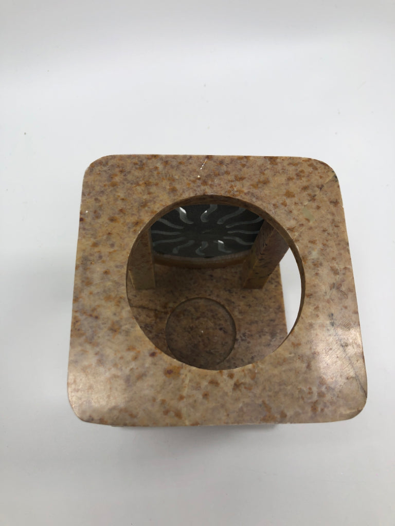 MARBLE CANDLE HOLDER W/METAL SUN DECALS.